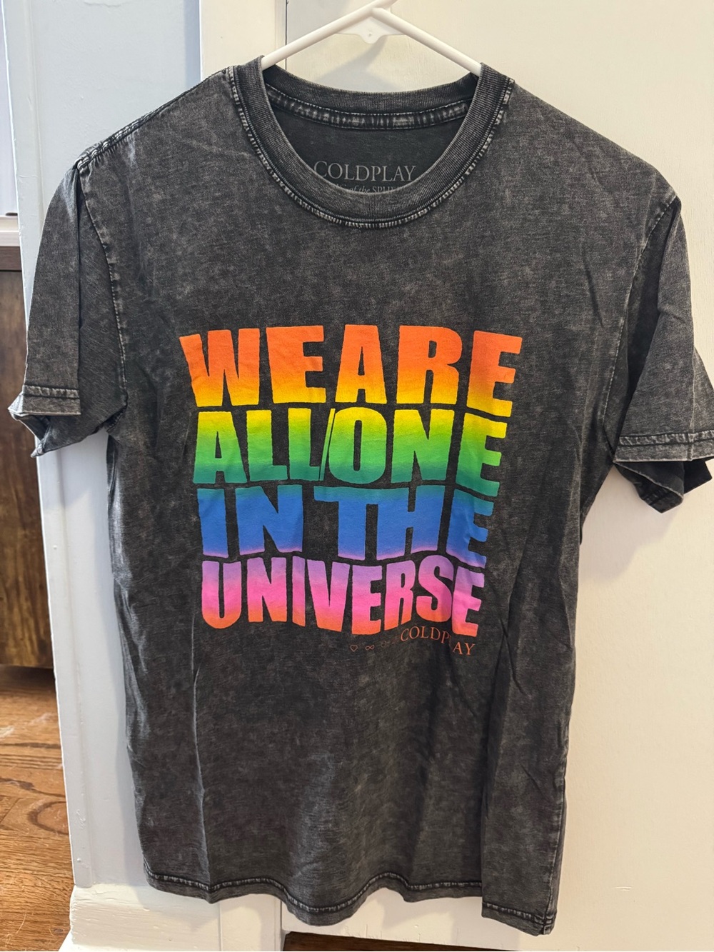 Coldplay 'We Are All One In The Universe' Rainbow Graphic Tee - Black